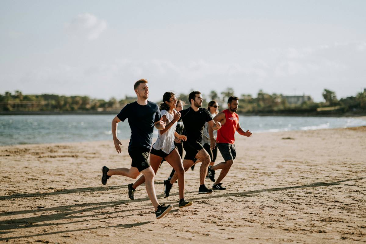 Man achieving Lean Body transformation with L-carnitine and resistance training